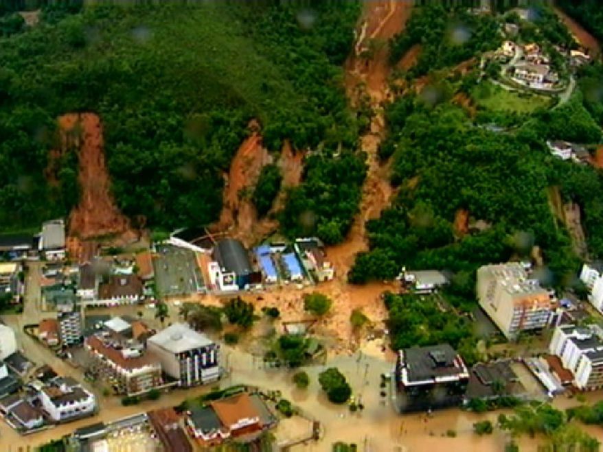 A frame grab from video shows an aerial view of a mudslide in Teresopolis, Brazil, on Wednesday, Jan. 12, 2011. Torrential rain tore through Rio de Janeiro state's mountains, killing at least 140 people in 24 hours, the state's emergency rescue office said. (AP Photo/TV Globo, Agencia O Globo)