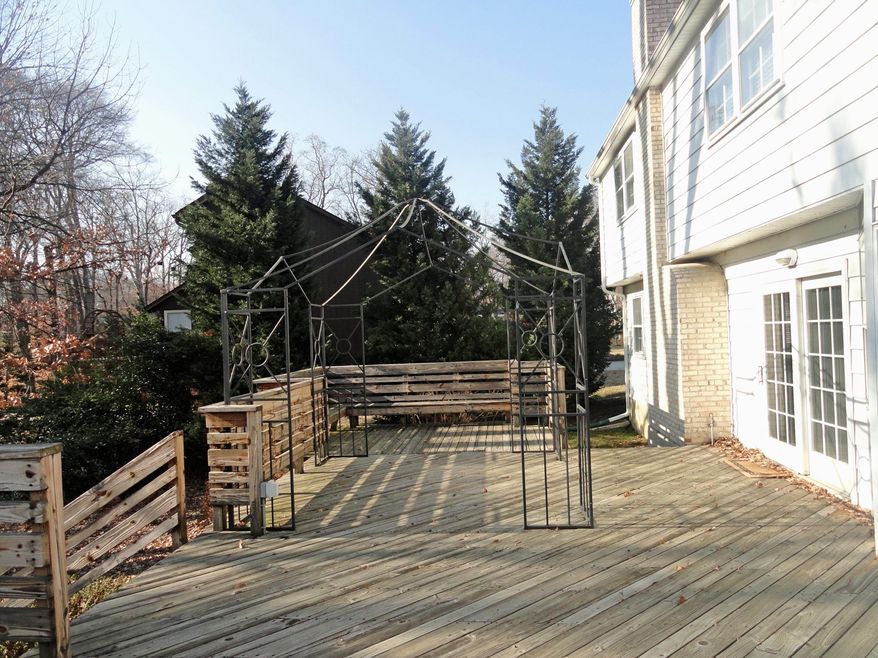 The current homeowner says it took him a year to build the 40-by-20-foot deck that stretches along the back of the house.