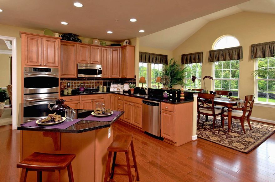 The Zachary model at Fairwood includes a morning room and breakfast area off the center-island kitchen, with an adjacent family room. Buyers can add extra windows and extend the family room. The Zachary is priced from $385,990.