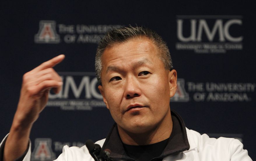 Dr. Peter Rhee, Trauma and Critical Care Emergency Surgery doctor at University Medical Center, describes in more detail the gunshot wound Rep. Gabrielle Giffords, D-Ariz.,received on Saturday, during a news briefing at UMC in Tucson, Ariz., on Jan. 11, 2011. Mrs. Giffords remains in critical condition, but doctors have reported steady progress each day since she was wounded last weekend. (AP Photo/Ross D. Franklin, File)