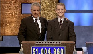 ** FILE ** In this July 13, 2004, file photo provided by Sony Pictures Television, software developer Ken Jennings from Salt Lake City, Utah, right, poses for a photo with Jeopardy host Alex Trebek on the set of the show in Culver City, Calif. On Thursday, Jan. 13, 2011, the IBM hardware and software system named Watson was to play a practice round against Ken Jennings, who won a record 74 consecutive &quot;Jeopardy!&quot; games in 2004-05, and Brad Rutter, who won a record $3,255,102 in prize money. (AP Photo/Sony Pictures Television, File)

