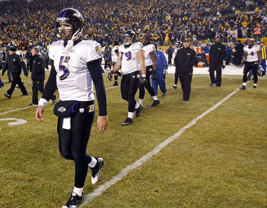 Baltimore Ravens quarterback Joe Flacco (5) walks off the field after losing 31-24 to the Pittsburgh Steelers in an NFL divisional football game in Pittsburgh, Saturday, Jan. 15, 2011. (AP Photo/Keith Srakocic)