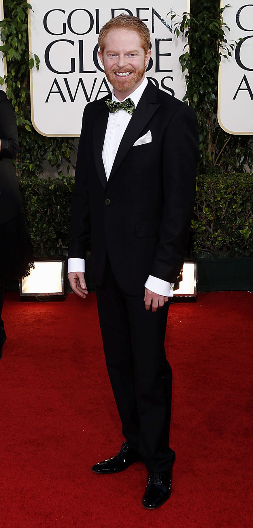 Jesse Tyler Ferguson of "Modern Family," arrives for the Golden Globe Awards Sunday, Jan. 16, 2011, in Beverly Hills, Calif. (AP Photo/Matt Sayles)
