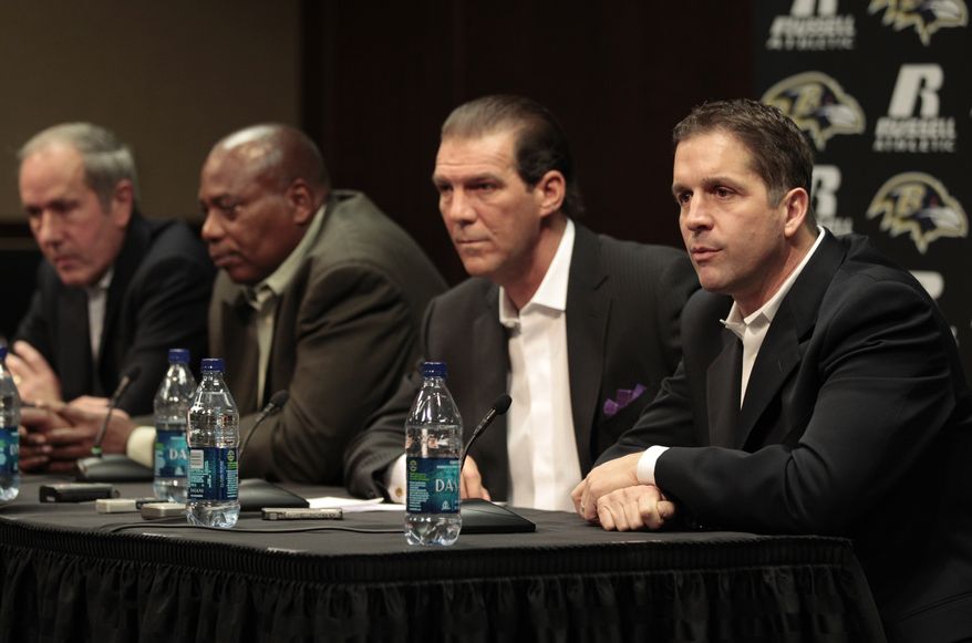 Baltimore Ravens president Dick Cass, far left, general manager and executive vice president Ozzie Newsome, and owner Steve Bisciotti, listen as head coach John Harbaugh, far right, responds to a question during the football teams season review news conference, Thursday, Jan. 20, 2011, in Owings Mills, Md. (AP Photo/Rob Carr)