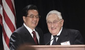 Former Secretary of State Henry A. Kissinger introduces China&#x27;s President Hu Jintao to leaders from the private and public sectors, Thursday, Jan. 20, 2011 in Washington, at a luncheon co-hosted by the U.S.-China Business Council. (AP Photo/Pablo Martinez Monsivais)