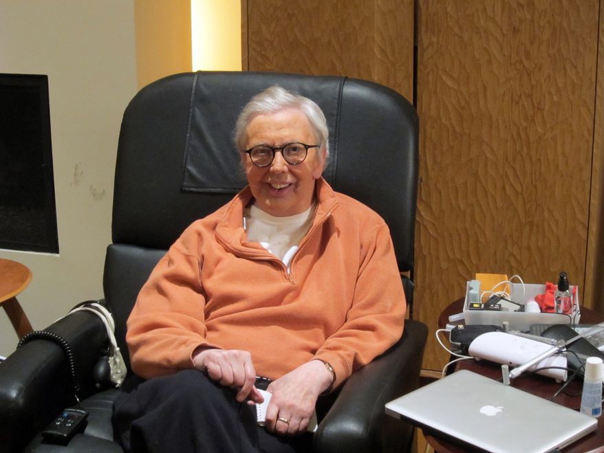This January 2011 photo provided by Roger Ebert shows the film critic wearing a silicone prosthesis over his lower face and neck. Ebert said in his Jan. 19 blog that he will wear the prosthesis for the "Roger's Office" segment of the new television show "Ebert Presents at the Movies." (AP Photo/Ebert Productions, David Rotter)