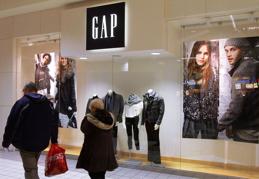 In this photo taken Dec. 6, 2010, visitors at shopping mall in Springfield, Ill. The Consumer Confidence Index rose in January to its highest point in eight months but remains well below the levels indicating a healthy economy.(AP Photo/Seth Perlman)