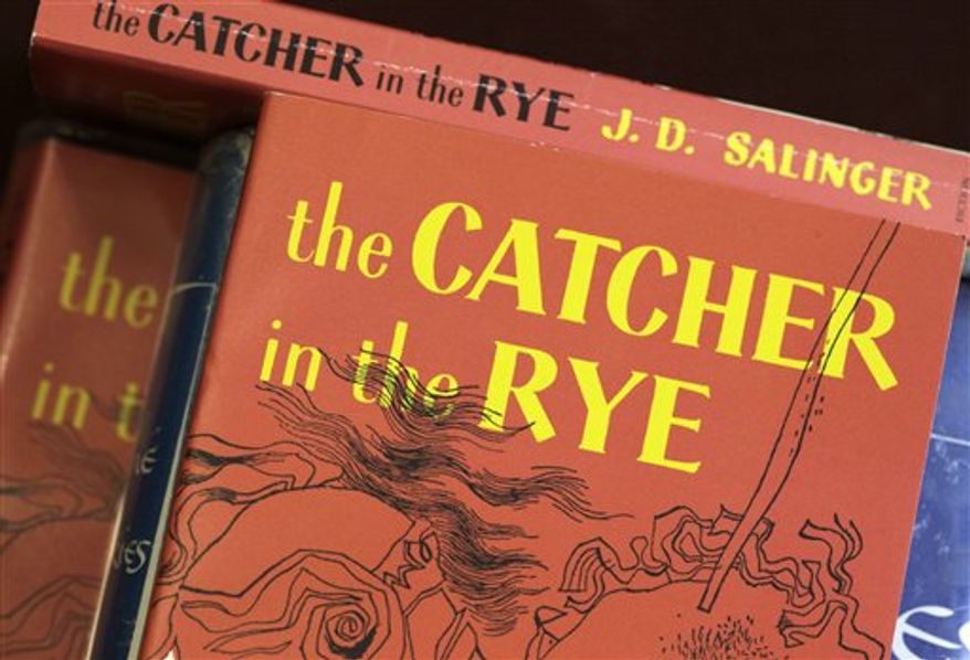 FILE - In this Jan. 28, 2010 file photo, copies of J.D. Salinger's classic novel "The Catcher in the Rye" are seen at the Orange Public Library in Orange Village, Ohio. (AP Photo/Amy Sancetta)