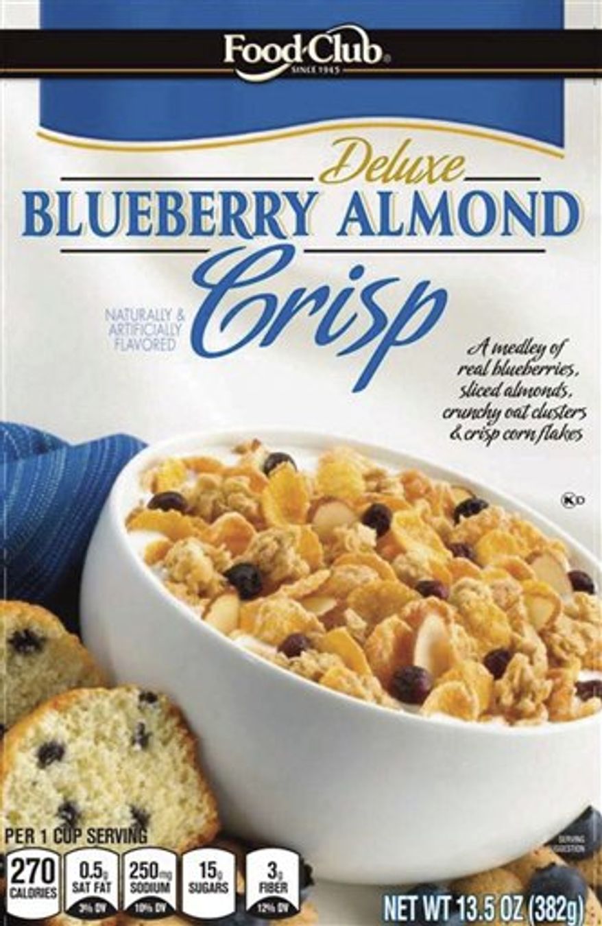 This product image provided by the Grocery Manufacturers Association shows new "Nutrition Keys" labels, lower left, as they would appear on a box of cereal. The Grocery Manufacturers Association and the Food Marketing Institute on Monday, Jan. 24, 2011 announced the industry's voluntary new labels, which will list calories, saturated fat, sodium and sugars per serving. (AP Photo/Grocery Manufacturers Association) NO SALES