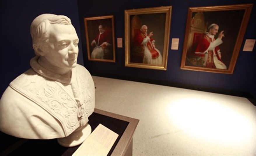 In this Jan. 24, 2011 photo, busts and portraits of Popes are shown at the Museum of Art Fort Lauderdale in Fort Lauderdale, Fla. The objects from the Vatican are touring in the exhibit "Vatican Splendors, A Journey Through Faith and Art," which runs from Jan. 29 to April 24. (AP Photo/Wilfredo Lee)