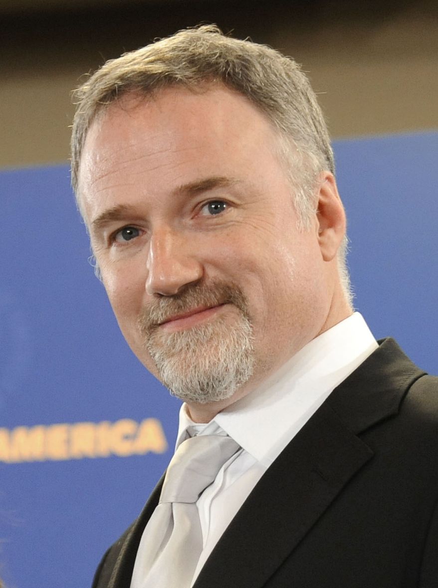 ** FILE ** In this Jan. 31, 2009, file photo, director David Fincher is shown backstage at the Directors Guild of America Awards in Los Angeles. Fincher was nominated for an Academy Award for best director for "The Social Network," on Tuesday, Jan. 25, 2011. The Oscars will be presented Feb. 27 at the Kodak Theatre in Hollywood. (AP Photo/Chris Pizzello, file)