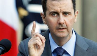 **FILE** Syrian President Bashar Assad (Associated Press)