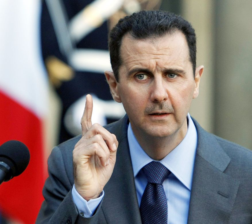 **FILE** Syrian President Bashar Assad (Associated Press)