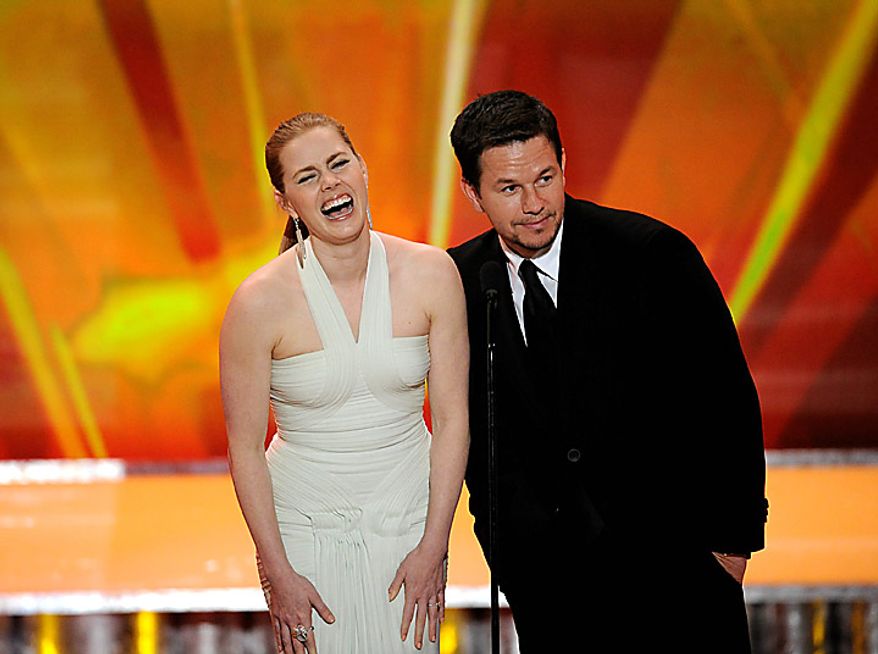 Amy Adams, left, and Mark Wahlberg share the stage at the 17th Annual Screen Actors Guild Awards on Sunday, Jan. 30, 2011, in Los Angeles. (AP Photo/Mark J. Terrill)
