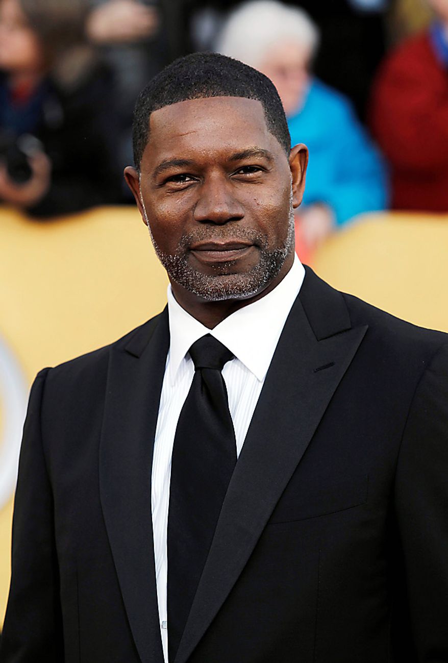 Dennis Haysbert arrives at the 17th Annual Screen Actors Guild Awards on Sunday, Jan. 30, 2011, in Los Angeles. (AP Photo/Matt Sayles)