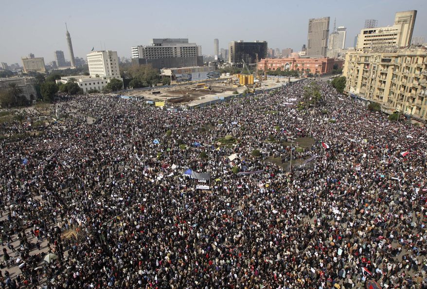 More than a quarter-million people gather in Tahrir, or Liberation, Square in central Cairo on Tuesday, Feb. 1, 2011, to demand that President Hosni Mubarak leave office after nearly 30 years in power. (AP Photo/Khalil Hamra)