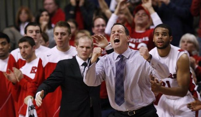 ** FILE ** Rutgers head coach Mike Rice, foreground, and others react to play late in the second half of an NCAA college basketball game against Pittsburgh, Saturday, Jan. 29, 2011, in Piscataway, N.J. Pittsburgh won 65-62. (AP Photo/Mel Evans)