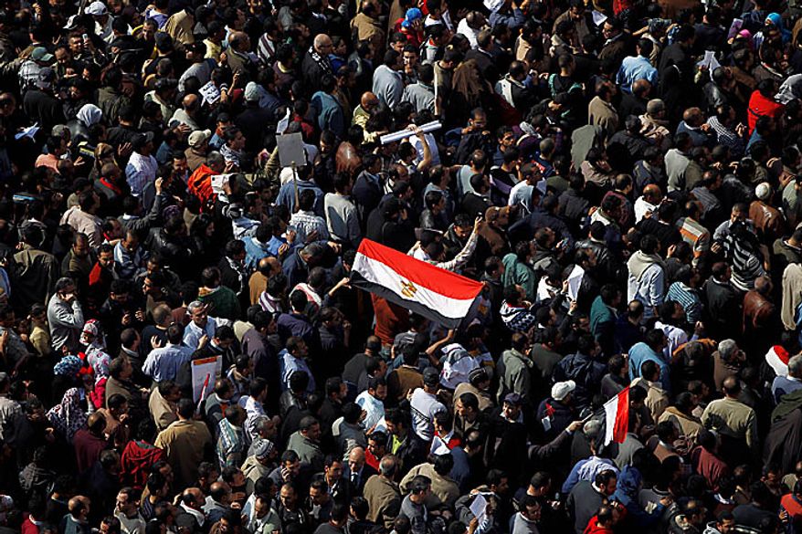 The crowd gathers in Tahrir, or Liberation, Square in Cairo on Tuesday, Feb. 1, 2011. More than a quarter-million people flooded into the heart of Cairo, filling the city's main square in by far the largest demonstration in a week of unceasing demands for President Hosni Mubarak to leave after nearly 30 years in power. (AP Photo/Tara Todras-Whitehill)