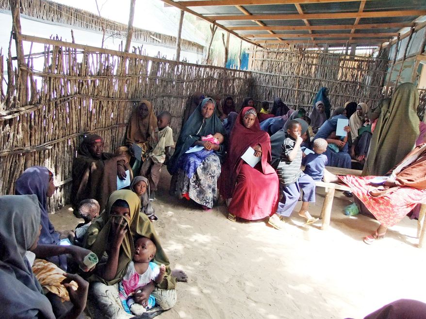 Patients await treatment at the Hawa Abdi hospital, which cared for more than 162,000 people last year. It now must perform brutal triage to determine who is most in need. (Associated Press)