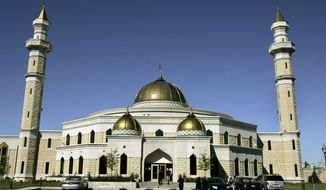 The Islamic Center of America in Dearborn, Mich., is one of the largest mosques in the nation. Roger Stockham was wearing a ski mask and had fireworks in his car nearby on Jan. 24 when he was arrested, police say. (Associated Press)
