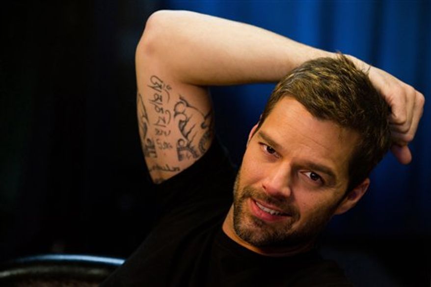 In this Jan. 31, 2011 photo, singer Ricky Martin poses for a portrait in New York. (AP Photo/Charles Sykes)