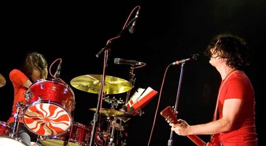 FILE - In this May 5, 2004 file photo, Meg White, left, and Jack White of The White Stripes are shown in New York. (AP Photo/ Diane Bondareff, file)