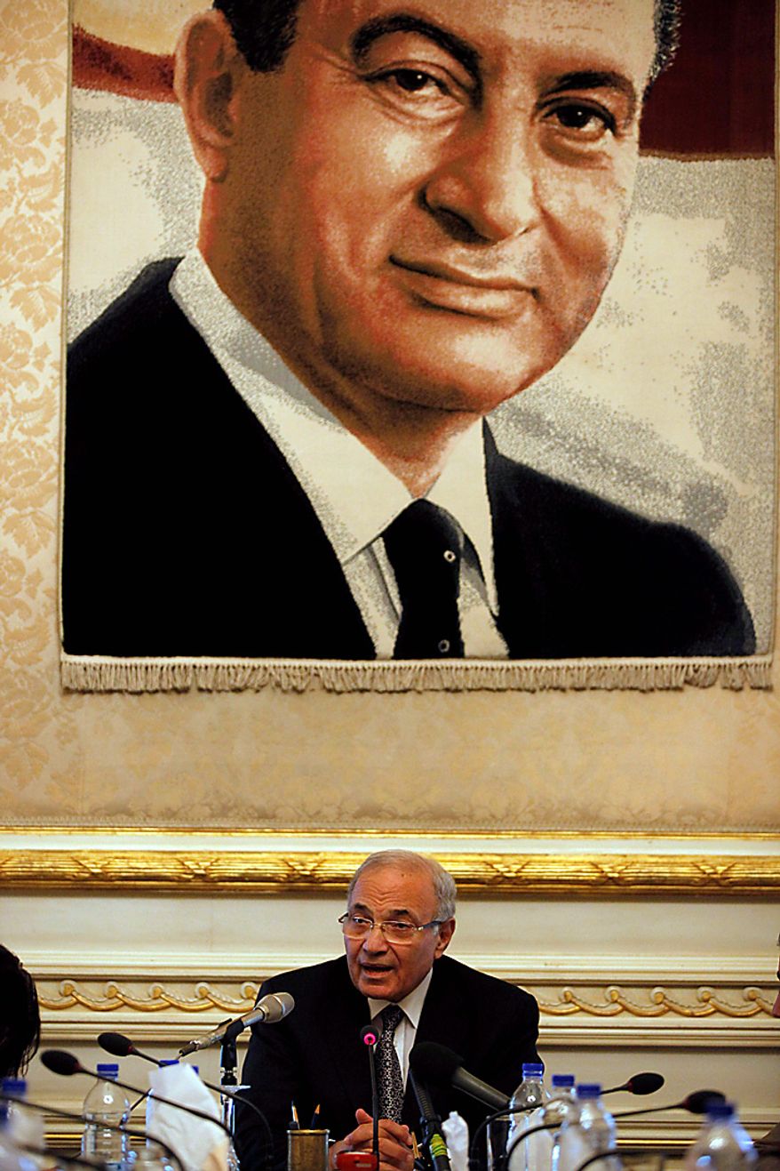 Egypt's recently appointed Prime Minister Ahmed Shafiq speaks to the media at the Ministry of the Interior in Cairo Thursday Feb.3, 2011. Mr. Shafiq apologized for the attack by regime supporters on anti-government protesters in central Cairo, vowing to investigate who was behind it. The protesters accuse the regime of sending a force of paid thugs and policemen in civilian clothes to attack them with rocks, sticks and firebombs to crush their movement to oust President Hosni Mubarak. (AP Photo/Victoria Hazou)