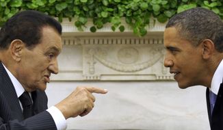 President Obama meets with Egyptian President Hosni Mubarak, left, in the Oval Office of the White House in Washington on Sept. 1, 2010. U.S. intelligence agencies&#39; failure to predict the uprisings in Tunisia and Egypt had drawn criticism from the White House and Congress. (AP Photo/Susan Walsh, File)