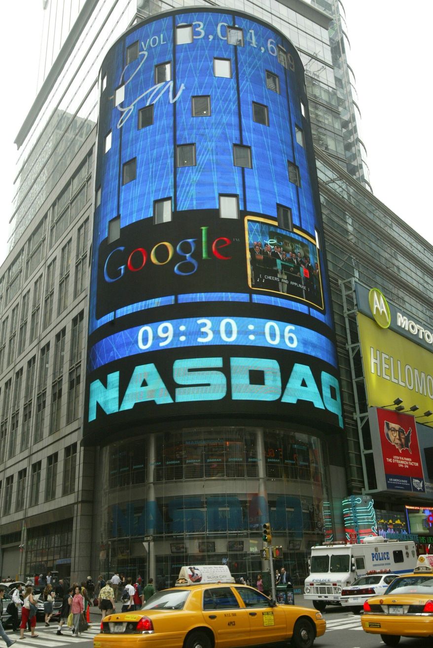 ** FILE ** The sign outside the NASDAQ Market site is seen in this Aug. 19, 2004, file photo taken in New York. (AP Photo/Kathy Willens, File)