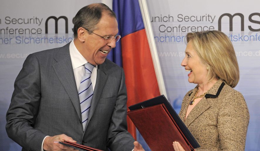 Secretary of State Hillary Clinton and Russian Foreign Minister Sergey Lavrov finalized the New START treaty in February 2011. Last month, the Uranium One case resurfaced when news reports revealed that the FBI apparently covered up information about illegal Russian attempts to lobby Mrs. Clinton. (Associated Press/File)