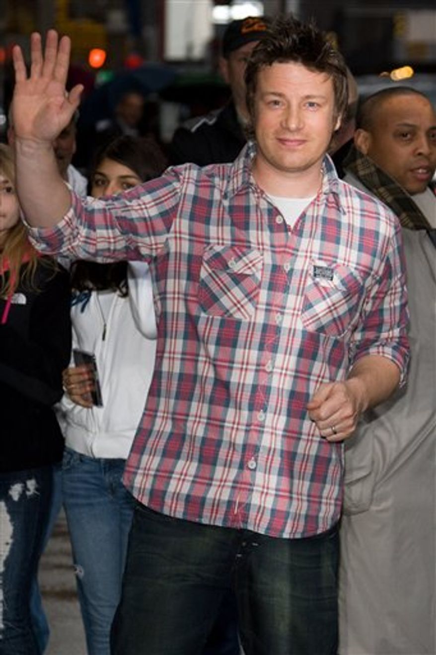 FILE - This March 23, 2010 photo shows Jamie Oliver as he leaves a taping of "The Late Show with David Letterman" in New York. (AP Photo/Charles Sykes)