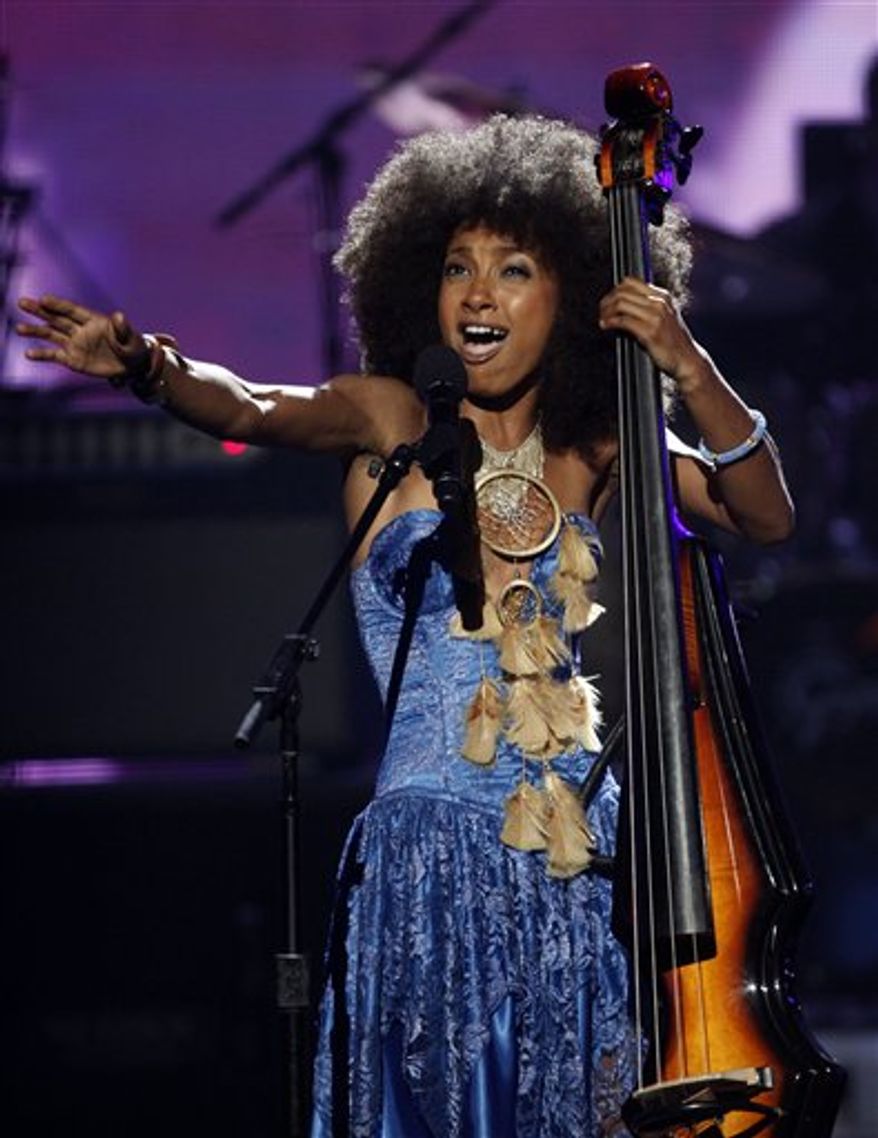 FILE - In this June 27, 2010 file photo, Esperanza Spalding performs at the BET Awards in Los Angeles. (AP Photo/Matt Sayles, file)