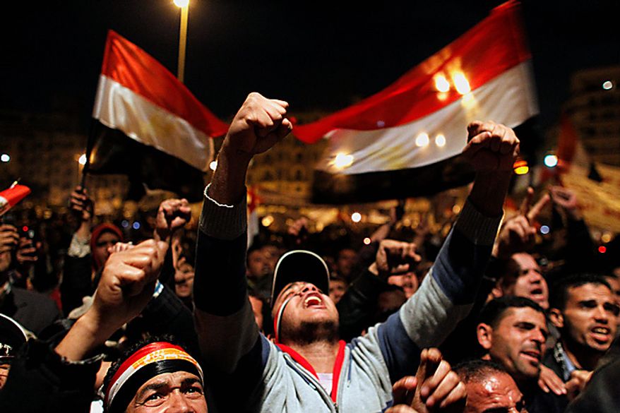 Anti-government protesters demonstrate in Tahrir Square in downtown Cairo, Egypt, Thursday, Feb. 10, 2011. Thousands of state workers and impoverished Egyptians launched strikes and protests around the country on Thursday over their economic woes as anti-government activists sought to expand their campaign to oust President Hosni Mubarak despite warnings from the vice president that protests won't be tolerated much longer. (AP Photo/Tara Todras-Whitehill)