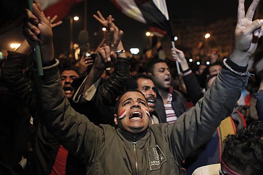 Anti-government protesters in Cairo's Tahrir Square react to Egyptian President Hosni Mubarak's televised statement to his nation Thursday, Feb. 10, 2011. Mr. Mubarak stepped down Friday. (AP Photo/Tara Todras-Whitehill)