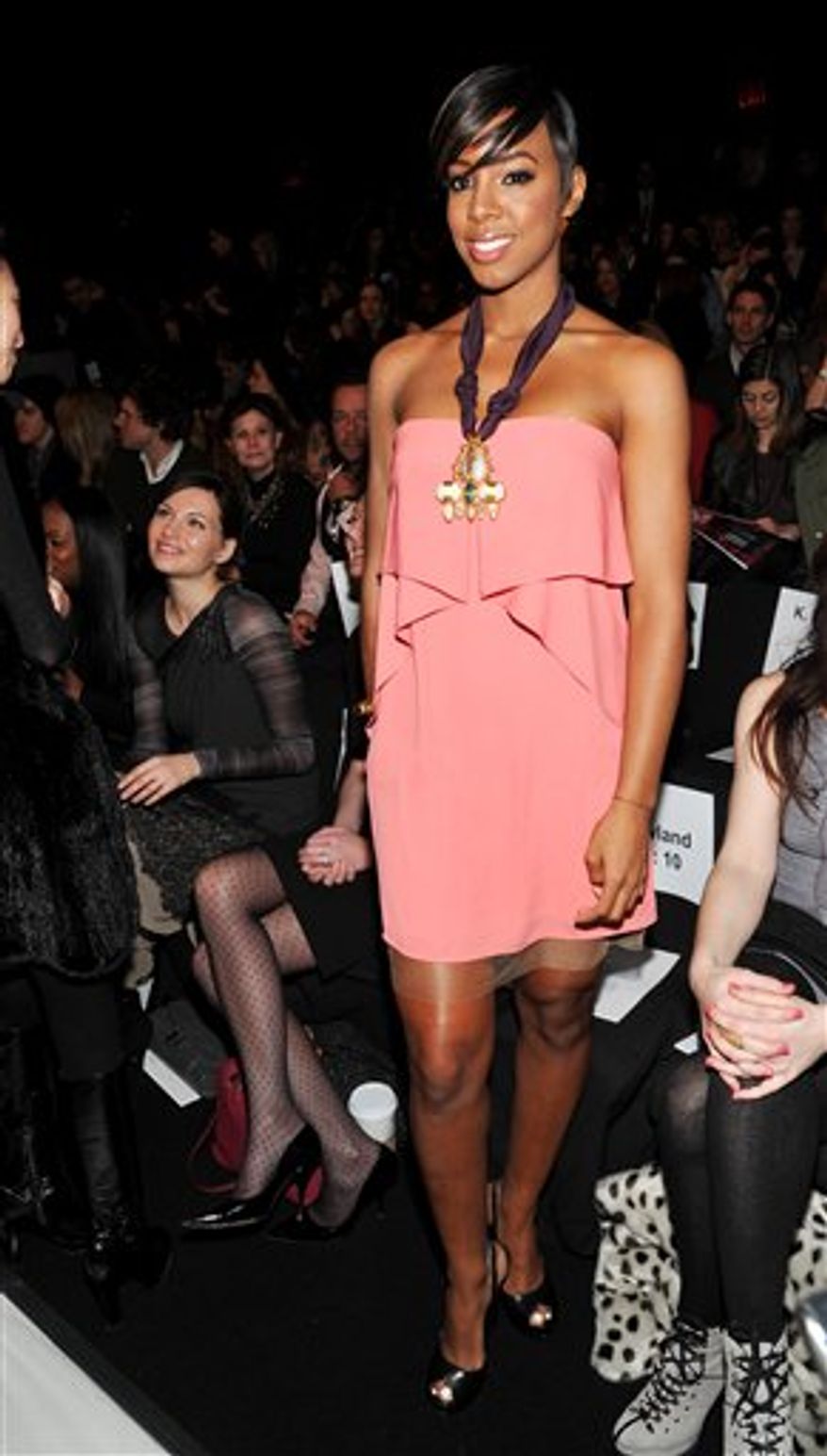 Singer Kelly Rowland attends the BCBGMAXAZRIA Fall 2011 fashion show at Mercedes-Benz Fashion Week on Thursday, Feb. 10, 2011 in New York. (AP Photo/Evan Agostini)