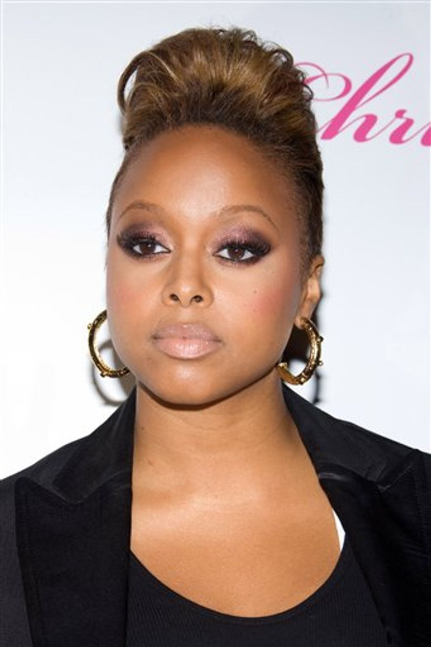 FILE - Singer Chrisette Michele attends her album release party at Mansion in New York, in this May 12, 2009 file photo. Michele, crooned "Unforgettable" as a tribute to jazz's influence on hip-hop at Thursday Feb. 11, 2011 at "Word Revolution: A Celebration of the Evolution of Hip-Hop," part of the Grammy Foundation's 13th annual music preservation project. (AP Photo/Charles Sykes, File)