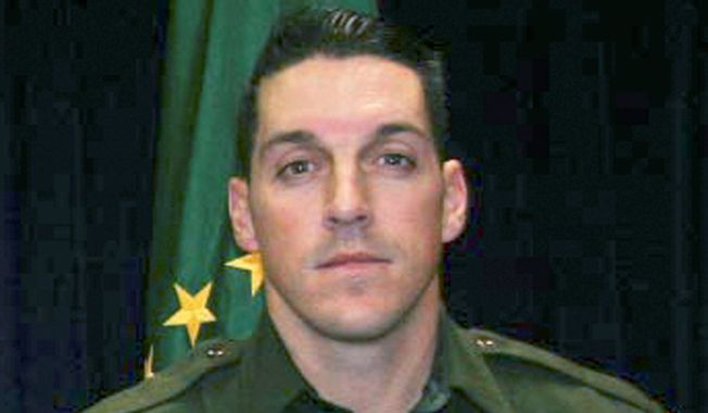 ** FILE ** U.S. Border Patrol agent Brian A. Terry was fatally shot north of the Arizona-Mexico border while trying to catch bandits who target illegal immigrants. (Associated Press)