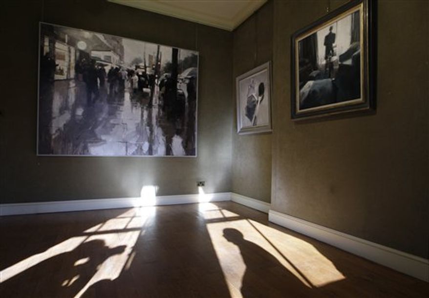 Visitors look at a painting 'Espionage', center, by artist James Hart Dyke on display in an exhibition 'A year with MI6' in Mount Street Gallery, London, Monday, Feb. 14, 2011. Artist James Hart Dyke on Monday unveiled a series of paintings and drawings created during a year embedded with Britain's MI6 intelligence agency, in an uncharacteristic act of openness for the secretive organization. (AP Photo/Sang Tan)