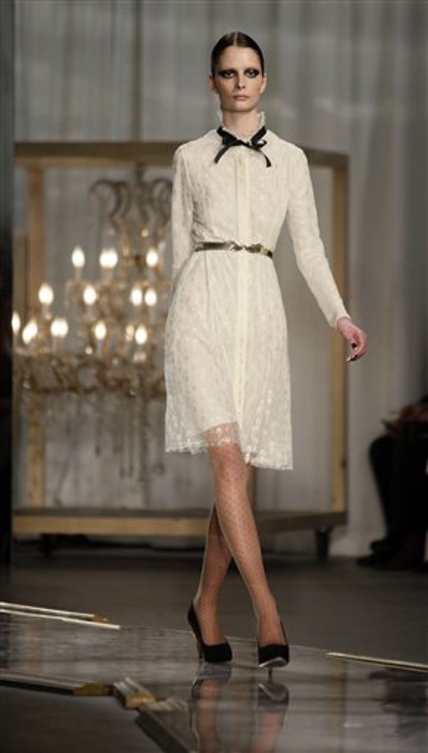 Fashion from the Fall 2011 collection of Jason Wu is modeled on Friday, Feb. 11, 2011 in New York. (AP Photo/Bebeto Matthews)