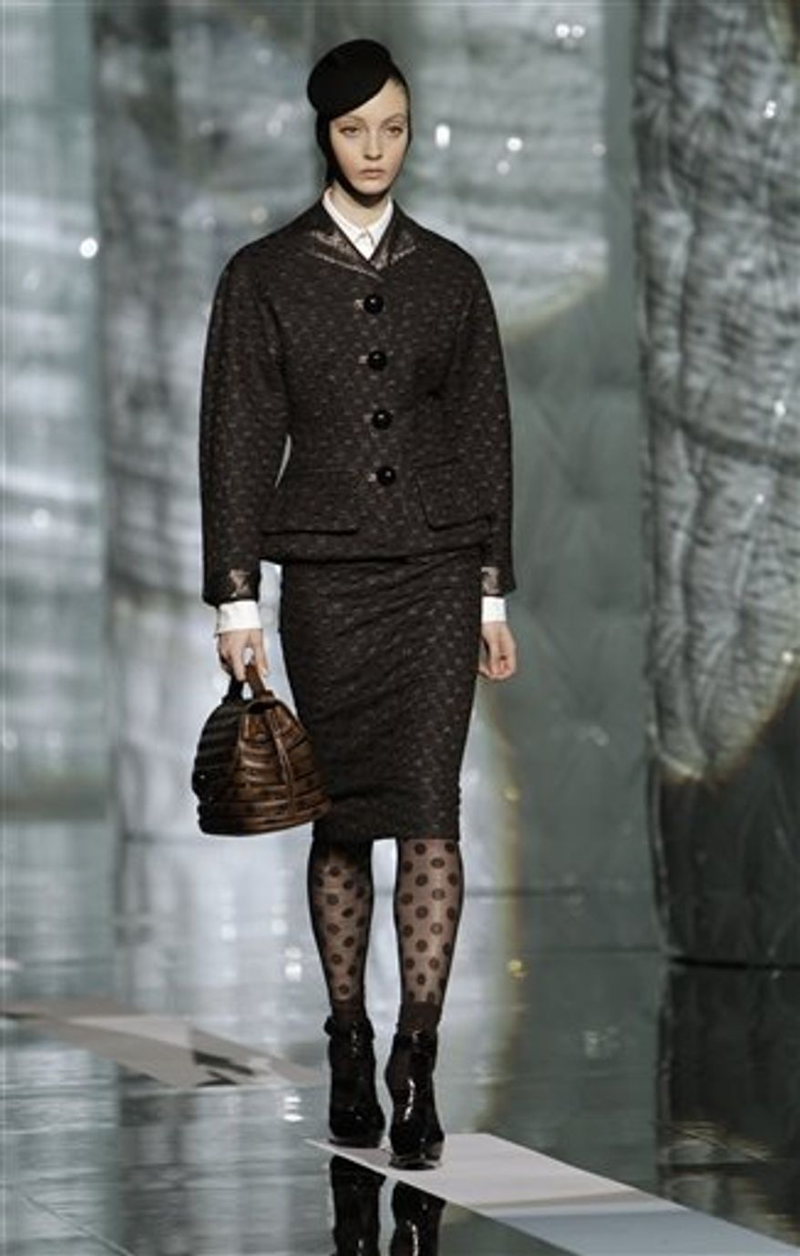 Models parade down the runway at the conclusion of the Marc Jacobs Fall 2011 show during Fashion Week in New York, Monday, Feb. 14, 2011. (AP Photo/Kathy Willens)