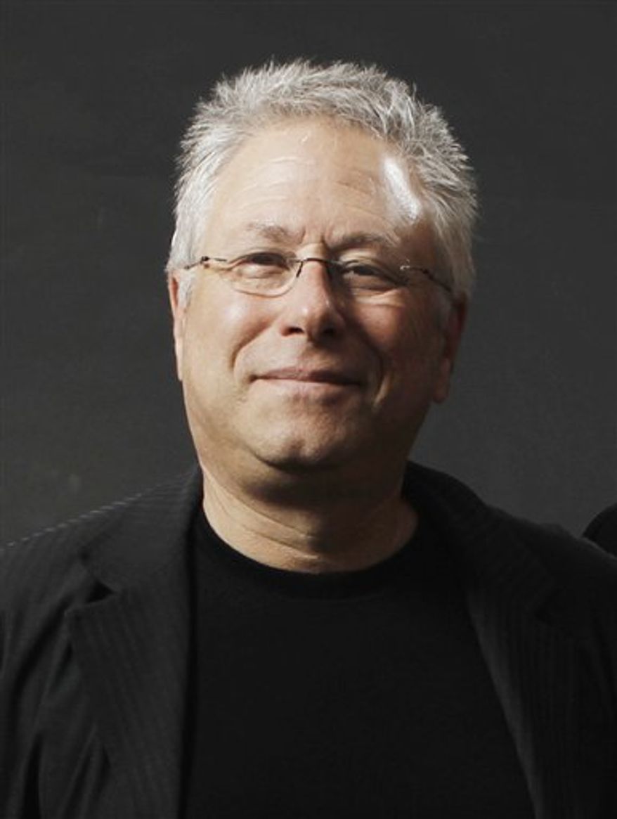FILE - In this Feb. 7, 2011 file photo, songwriter Alan Menken, poses for a portrait before the Academy Award Nominees Luncheon in Beverly Hills, Calif. (AP Photo/Matt Sayles, file)