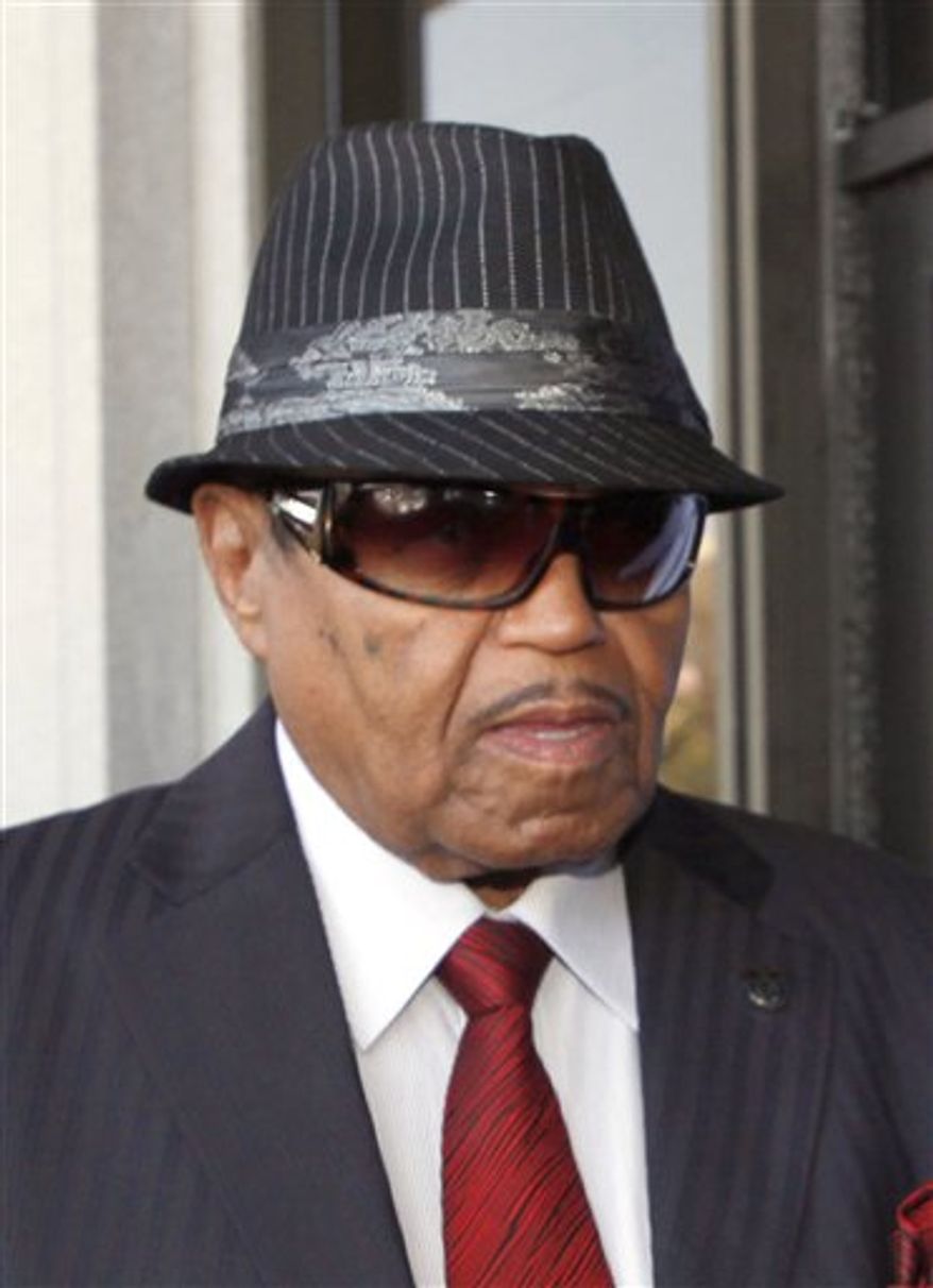 FILE - In this June 14, 2010 file photo Joe Jackson, the father of the late pop star Michael Jackson, arrives to a Los Angeles courthouse for a preliminary hearing setting and motions in the trial of Jackson's personal doctor Conrad Murray. Joe Jackson was in Vietnam to attend groundbreaking ceremony for a five-star hotel and amusement park called "Happyland" on Monday, Feb. 14, 2011. (AP Photo/Nick Ut, File)