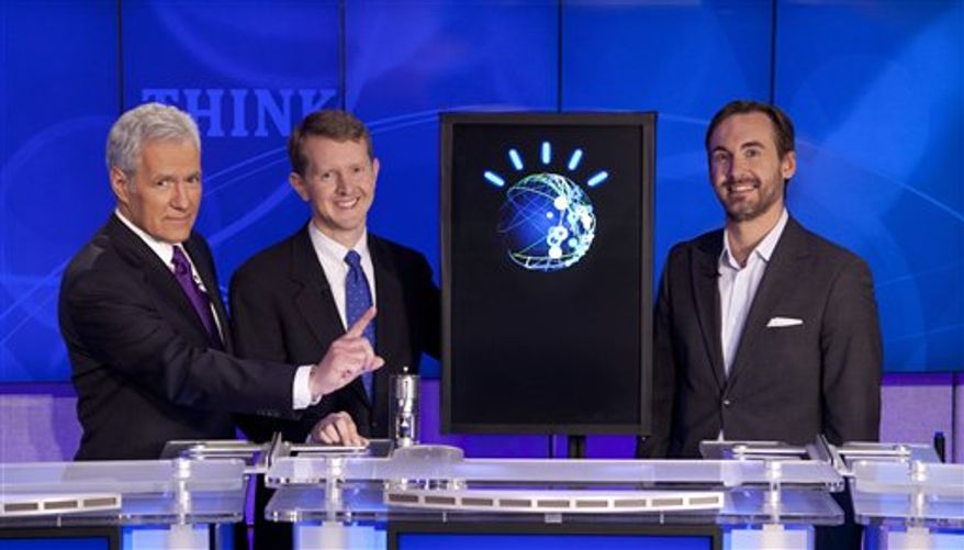 In this undated publicity image released by Jeopardy Productions, Inc., contestants Ken Jennings, left, and Brad Rutter and a computer named Watson compete on the game show "Jeopardy!" in Yorktown Heights, N.Y. (AP Photo/Jeopardy Productions, Inc., Carol Kaelson ) NO SALES