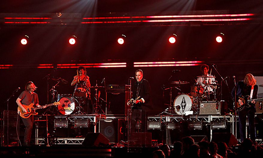 Arcade Fire perform at the 53rd annual Grammy Awards on Sunday, Feb. 13, 2011, in Los Angeles. (AP Photo/Matt Sayles)