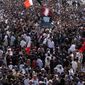 Streets in Jidhafs, Bahrain, are jammed Tuesday in a funeral procession for Ali Abdulhadi Mushaima, 21, killed in Monday&#39;s protests. Anger intensified when one of the mourners was shot fatally. (Associated Press)