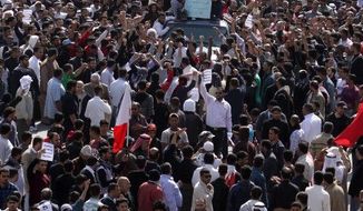 Streets in Jidhafs, Bahrain, are jammed Tuesday in a funeral procession for Ali Abdulhadi Mushaima, 21, killed in Monday&#39;s protests. Anger intensified when one of the mourners was shot fatally. (Associated Press)