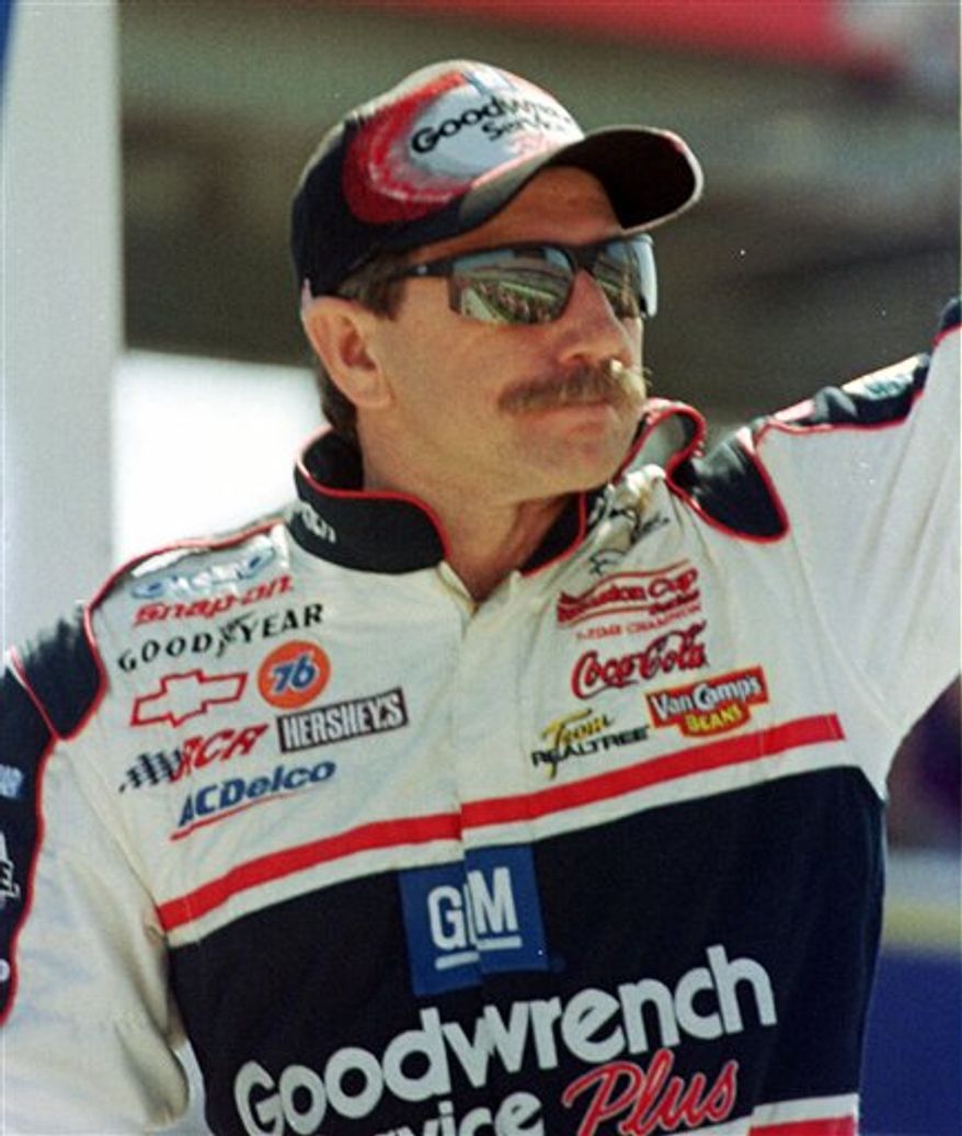 FILE - In this file photo taken Feb. 18, 2001, Dale Earnhardt's (3) window pops out of the car after being hit by Ken Schrader (36) during the Daytona 500 at the Daytona International Speedway in Daytona Beach, Fla. Getting by are drivers Bobby hamilton (55), Jeremy Mayfield (12), Bill Elliott (9) and Ricky Rudd (28). Earnhardt had to be cut from his battered car and was taken to Halifax Medical Center, where he was pronounced dead of head injuries. The 10-year anniversary of Earnhardt's fatal accident falls on Friday, Feb. 18, 2011, just two days before the season-opening Daytona 500, NASCAR's version of the Super Bowl. (AP Photo/Greg Suvino, file)