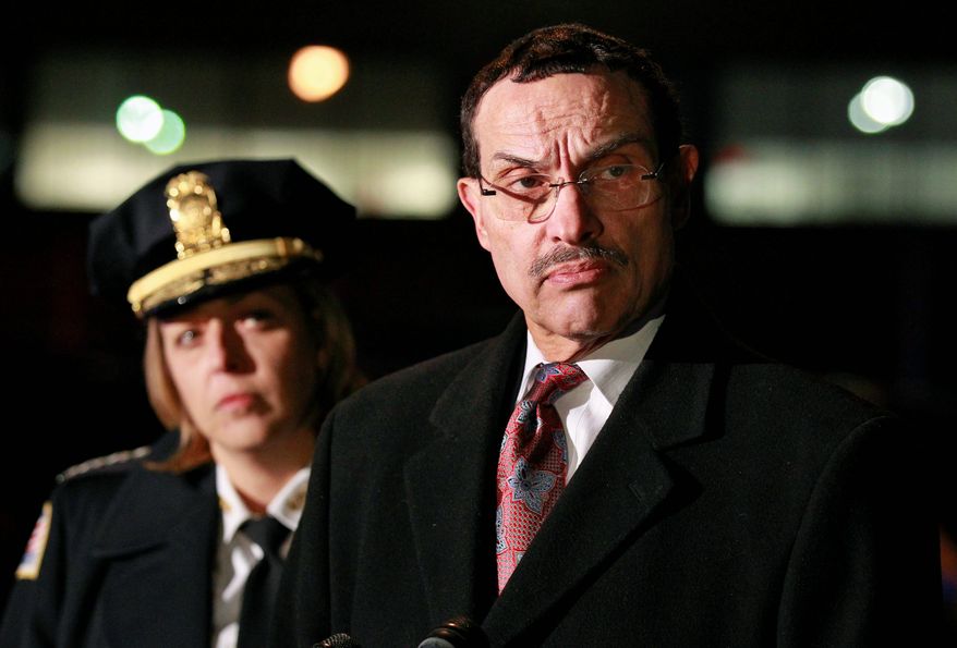 ** FILE ** D.C. Mayor Vincent C. Gray and Metropolitan Police Chief Cathy L. Lanier (Associated Press)