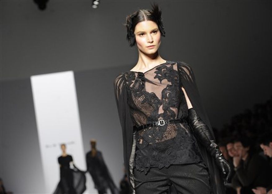 The Elie Tahari Fall 2011 collection is modeled during Fashion Week, Wednesday, Feb. 16, 2011, in New York. (AP Photo/Louis Lanzano)