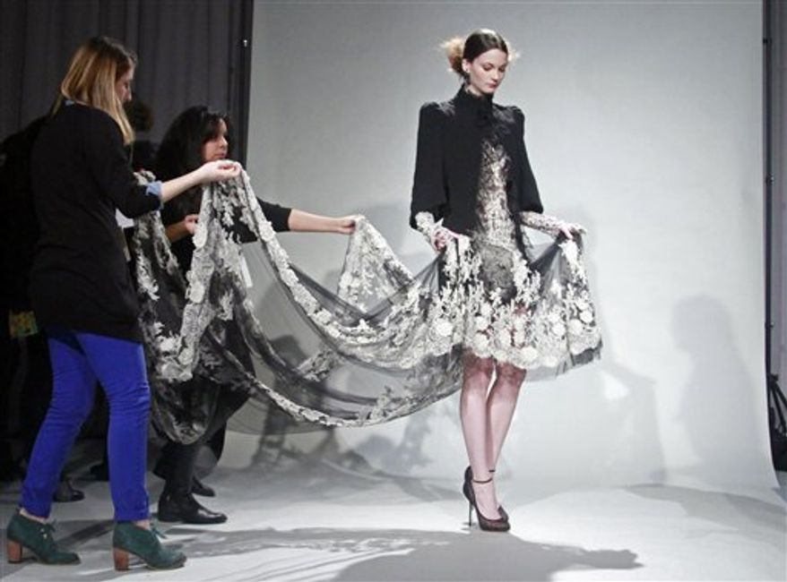 Fashion from the fall 2011 Marchesa collection is modeled on Wednesday, Feb. 16, 2011 in New York. (AP Photo/Bebeto Matthews)